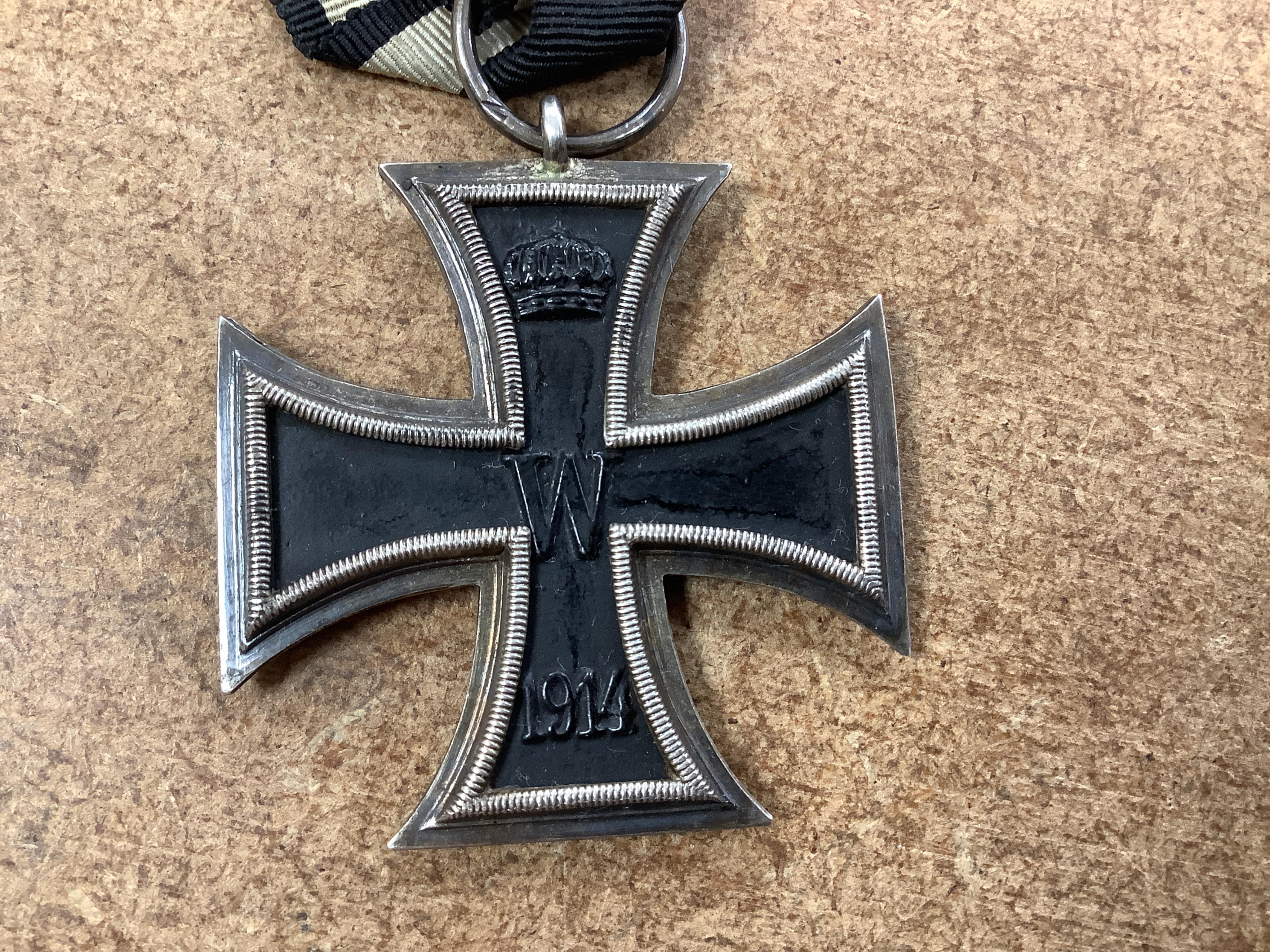 Four First World War German medals; a First Class Iron Cross, a 2nd Class Iron Cross, a 1914-1918 Honour Cross and an Austro-Hungarian Medal for Bravery, together with a wound badge and the related stick pin for the meda
